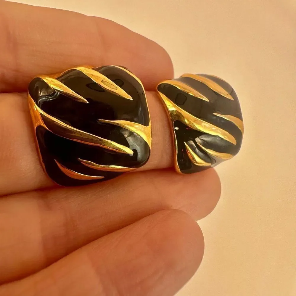 Gold tone and black square post earrings